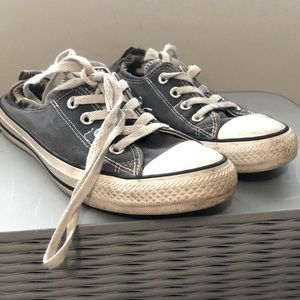 Navy low-top converses.